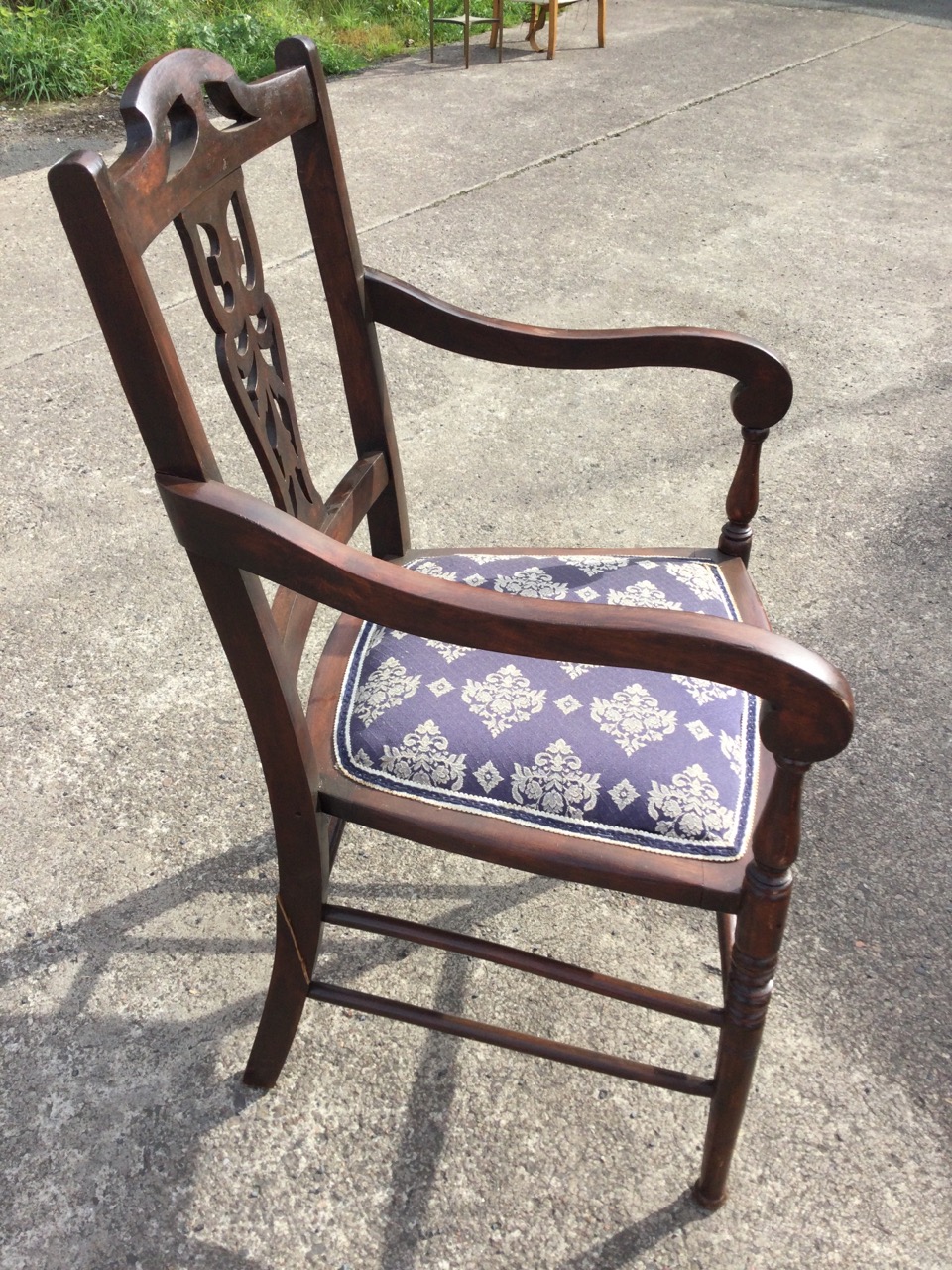 A stained Edwardian armchair with pierced fretwork splat to back, having scrolled arms on baluster - Image 2 of 3