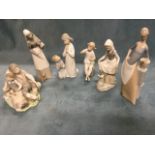 Five Lladro and one Nao Spanish porcelain figural pieces. (6)