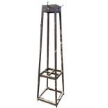 A square tapering hallstand with pegs to frame, the base with four divisions for sticks. (18.5in x