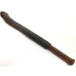 An ancient knobkerrie style bark covered war club weapon, possibly rungu, with turned handle. (21.