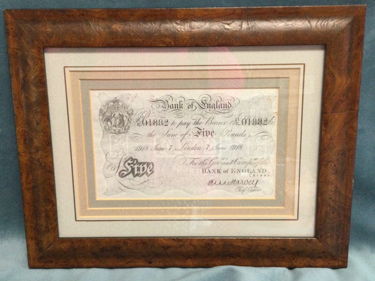 A 1918 £5 note, the watermarked paper mounted & walnut framed. (8in x 5in) - Image 2 of 3