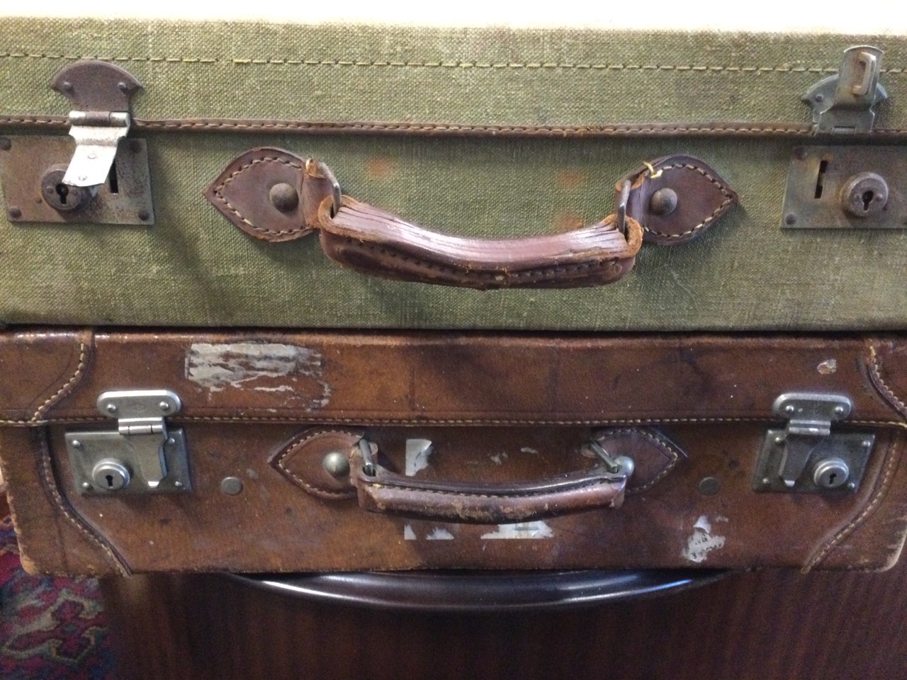 An Edwardian lined hand-stitched leather suitcase with chrome mounts; and a 1943 army canvas - Image 2 of 3