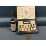 A C20th bottle of the Macallan single highland malt scotch whisky, the sealed bottle 700ml; a box of