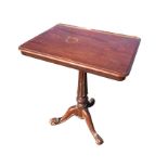 A Victorian mahogany reading table, the rectangular moulded top rising on ratchet support, supported