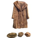 A ladies lined mink coat with wide collar and associated hat; a Karen Davis faux leopard skin floppy