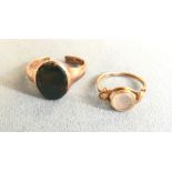 A circular Victorian gold intaglio cut seal ring with scrolled snake mount to twin band; and 9ct
