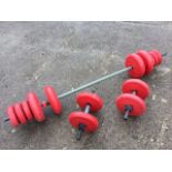 A set of Orbatron training weights with bar, complete with a pair of smaller hand bars & weights. (