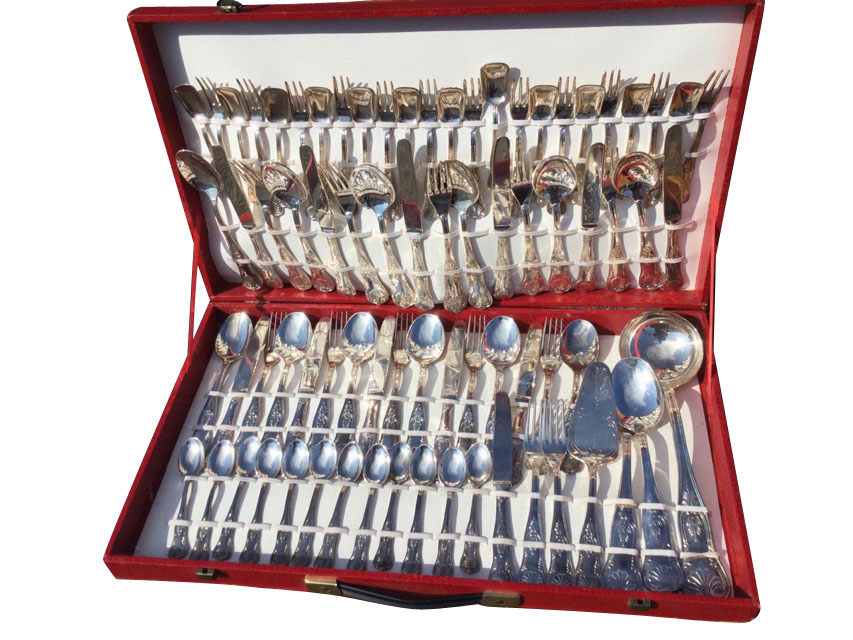 A canteen of Italian silver plated queens pattern cutlery, the handles embossed with shells and