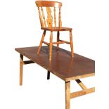 A rectangular folding wallpapering table; and a pine kitchen chair. (2) (63in x 31.5in x 28in)