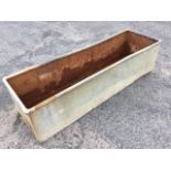 A 5ft rectangular galvanised trough with tubular rim. (61in x 17.5in x 15.5in)