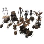 A collection of welded steampunk type iron models constructed out of nuts & bolts, including