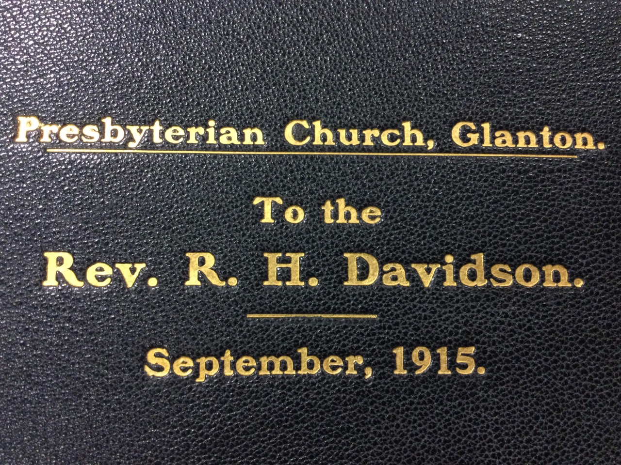 A 1915 illuminated leather bound presentational volume dedicated to the Rev RH Davidson, vicar of - Image 3 of 3