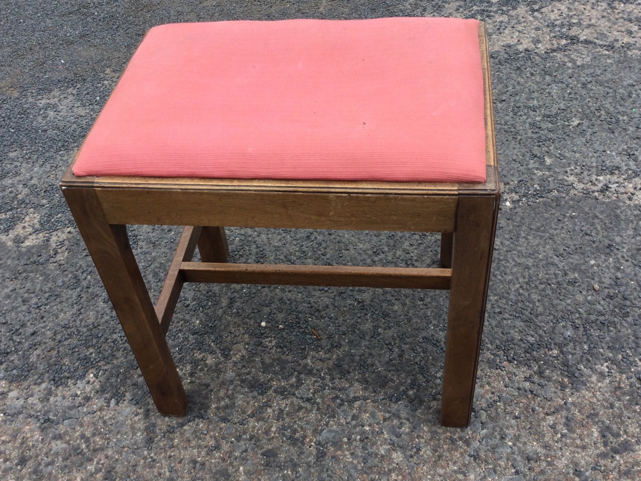 A Georgian style rectangular mahogany dressing table stool, having drop-in upholstered seat on