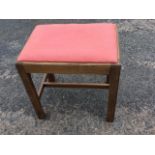 A Georgian style rectangular mahogany dressing table stool, having drop-in upholstered seat on