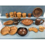 A collection of turned and carved hardwood bowls, jugs, vases, fruit bowls, yew, platters, oriental,