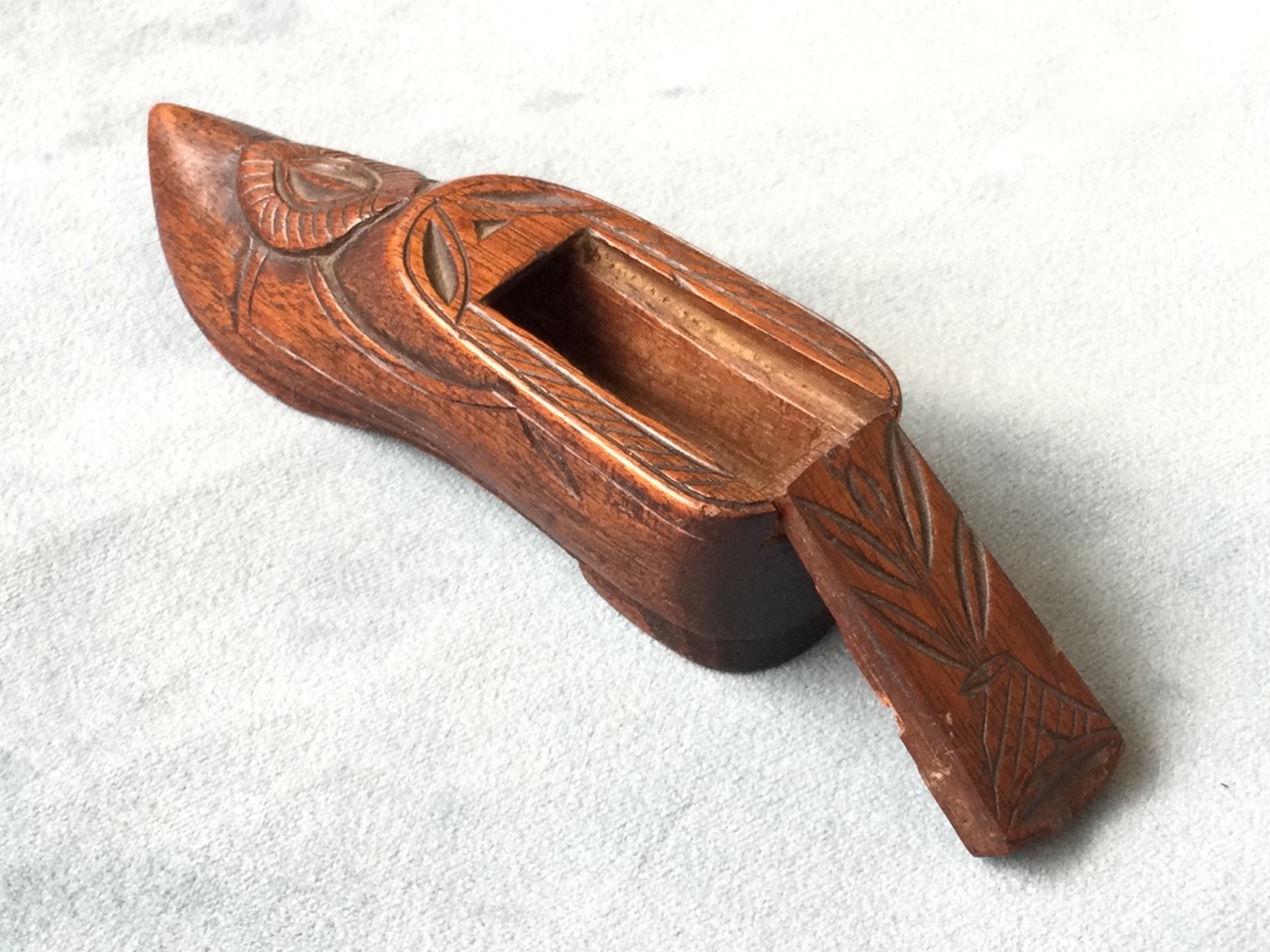 A nineteenth century carved mahogany snuff box in the form of a shoe, the sliding lid with chisel - Image 2 of 3