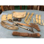 Various military belts - leather & canvas, a leather ammunition belt, canvas gaiters, a 1947 leather