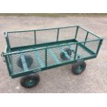 A rectangular garden four wheel trolley, the basket cage with drop-down ends. (48in x 24in x 25.