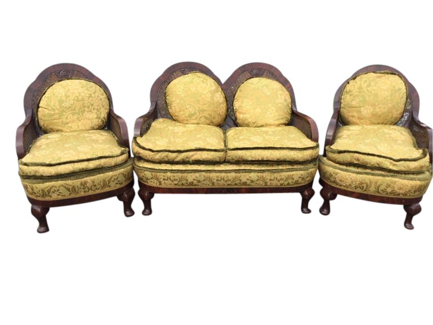 A 1940s mahogany bergére suite with two-seater sofa and two armchairs, the scalloped arched backs