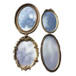 Four oval gilt & gesso framed mirrors, two with bevelled plates. (4)