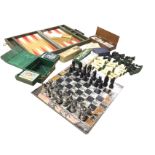 Miscellaneous games including two sets of chess pieces, card games, boxed sets of dominoes, a