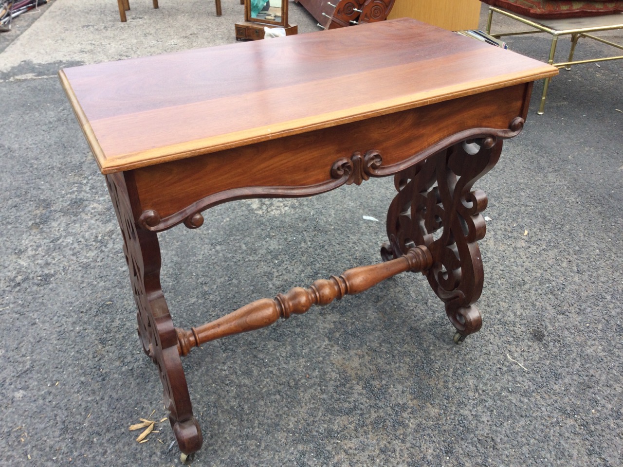 A nineteenth century mahogany occasional table with rectangular moulded top above scroll carved - Image 2 of 3