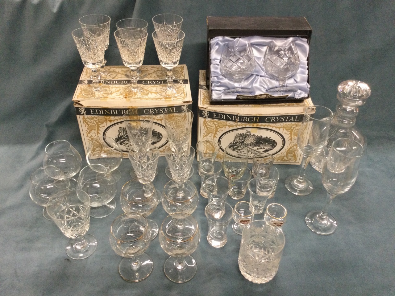 Miscellaneous drinking glasses and a decanter, including some boxed Edinburgh crystal wine