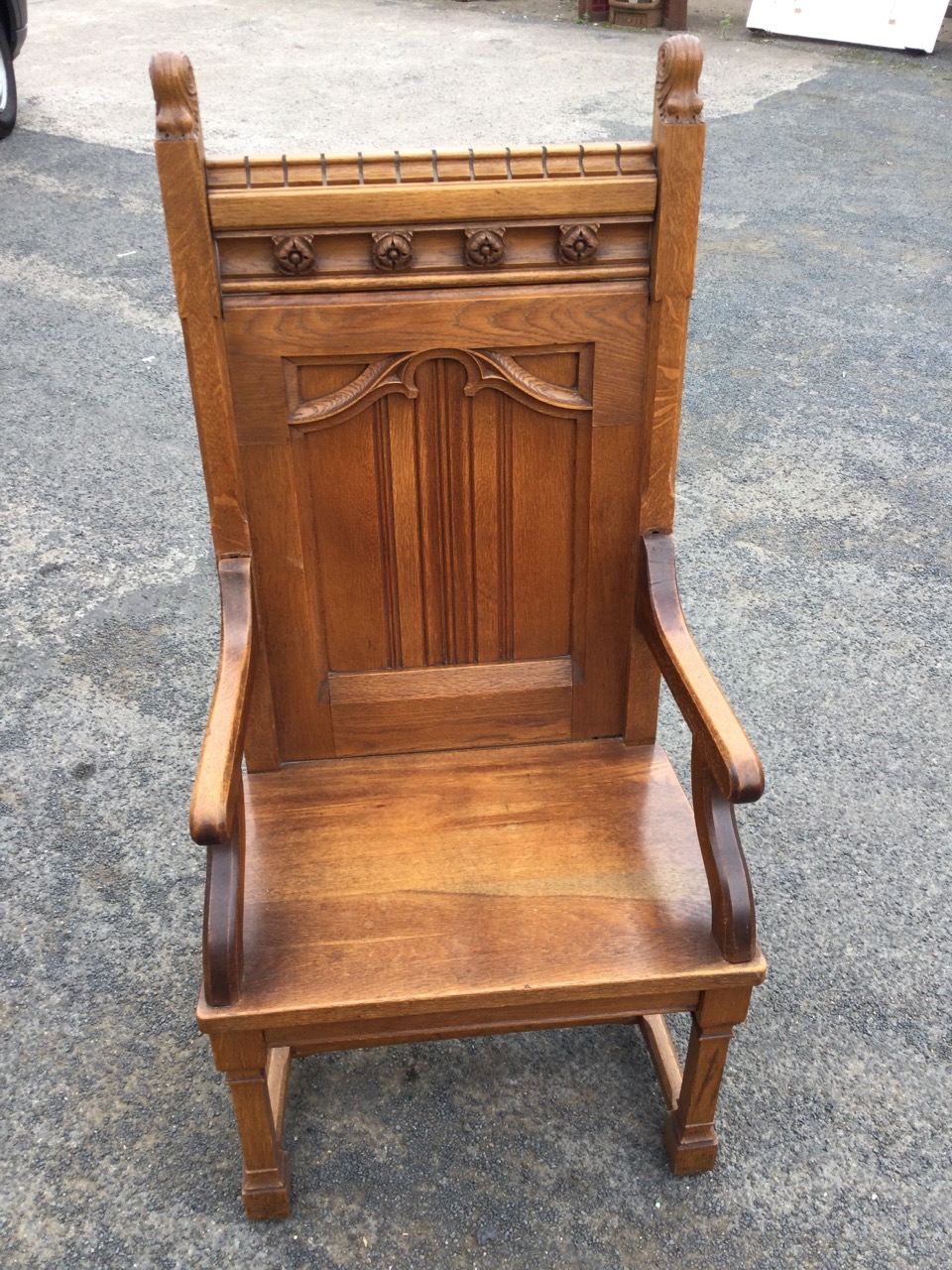 A late Victorian oak armchair with dentil moulding to back rail above a frieze mounted with carved - Image 2 of 3