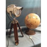A Danish globe electric tablelamp; and a searchlight style light on telescopic tripod stand. (2)