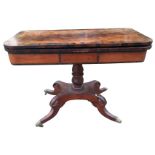 A George IV mahogany turn-over-top tea table, the rounded rosewood crossbanded top above a plain