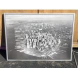 A large monochrome panoramic print of New York City skyline, framed. (55in x 39in)