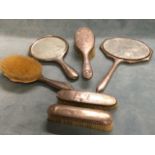 Six hallmarked silver ladies dressing table pieces - two mirrors, two hair brushes and two clothes