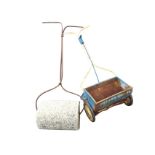 A Fisons mechanical lawn spreader; and a concrete garden roller with iron handle. (2)