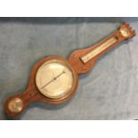 A nineteenth banjo barometer by Stopanie of Aberdeen, the mahogany boxwood strung case inlaid with