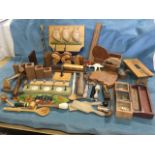 Miscellaneous treen including a burr clock, peg racks, candlestands, three boxed miniature marine