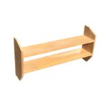 A rectangular pine wall shelf with two plank platforms and angled ends. (40in)