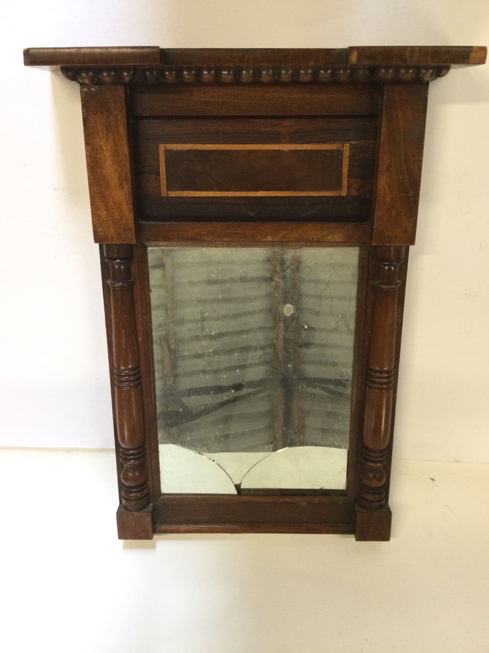 A nineteenth century mahogany pier glass with breakfront cornice above beading, having rosewood - Image 2 of 3