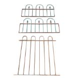 A run of dwarf railings in two sections with arches framing fleur-de-lils finials - 85.5in; and a