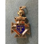 An enamelled gold fob of maltese cross form, one side with applied skull & crossbones with the