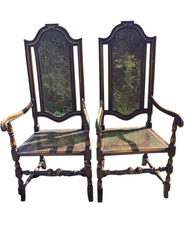 A pair of Queen Anne style side chairs, the backs with arched cushion moulded frames around cane
