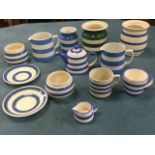 A collection of blue striped Cornishware - Staffordshire, two piece by Green, Ringtons, mugs,