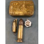 A heavy 4.5in trench made brass lighter with steel cap; another wartime tubular brass lighter; an