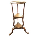 A Georgian oak shaving stand, the top with circular moulded ring for bowl on three column