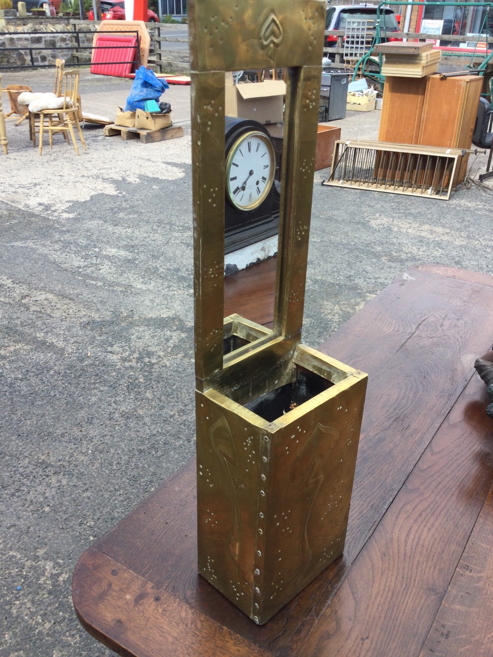 An art nouveau style brass wall pocket with rectangular frame to mirror above an open box, the brass - Image 2 of 3