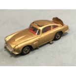 A Corgi James Bond Aston Martin DB5, having working ejector seat with man, rising back panel and