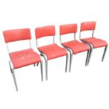 A set of four 60s alloy framed chairs with vinyl upholstered backs & seats, on angled tapering