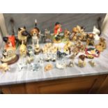 A collection of dog & cat ceramics figurines - Beswick, Border Fine Arts, Wade, resin, Disney cats &