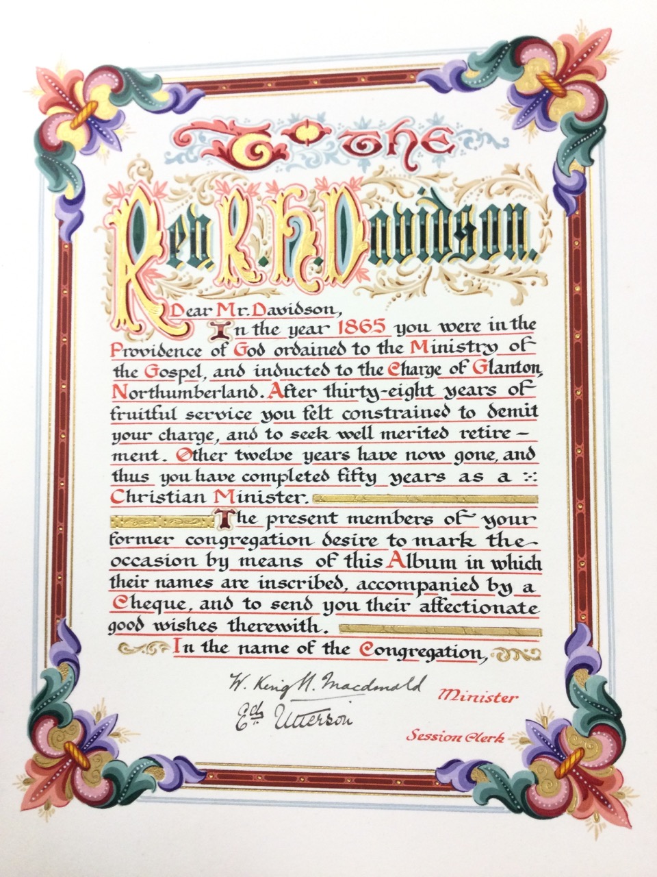 A 1915 illuminated leather bound presentational volume dedicated to the Rev RH Davidson, vicar of