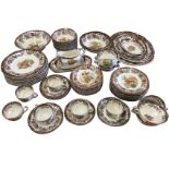 A Royal Worcester Palissy dinner/tea service decorated in the sepia Game Series pattern with