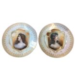 A pair of Rosenthall art nouveau style cabinet plates decorated with busts within scrolled borders